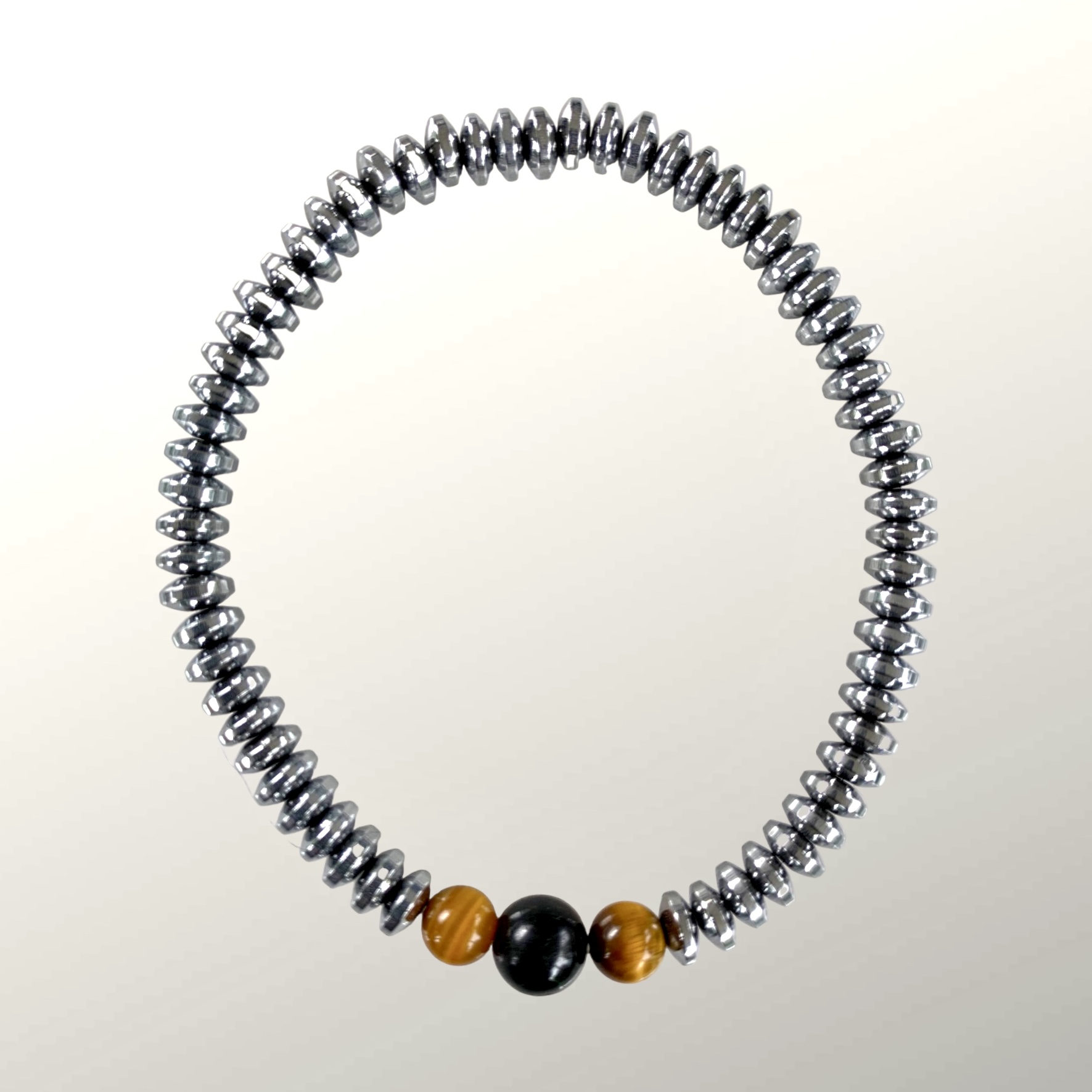 Bracelet de perles Hématite, Oeil de tigre et Spinelle