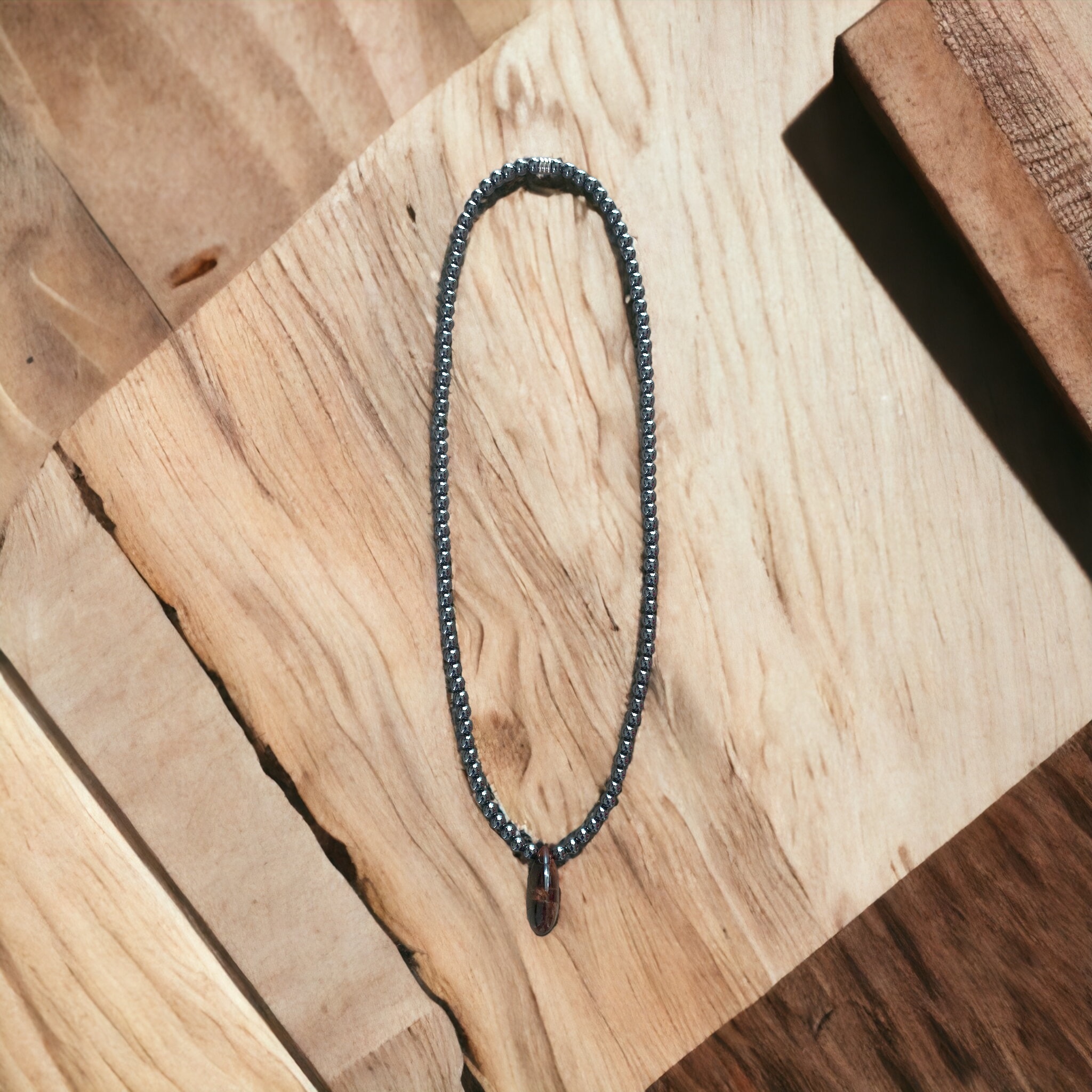 Collier Hématite et pendentif Oeil de Taureau